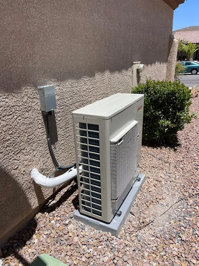 Residential air conditioning condenser unit in Silverton